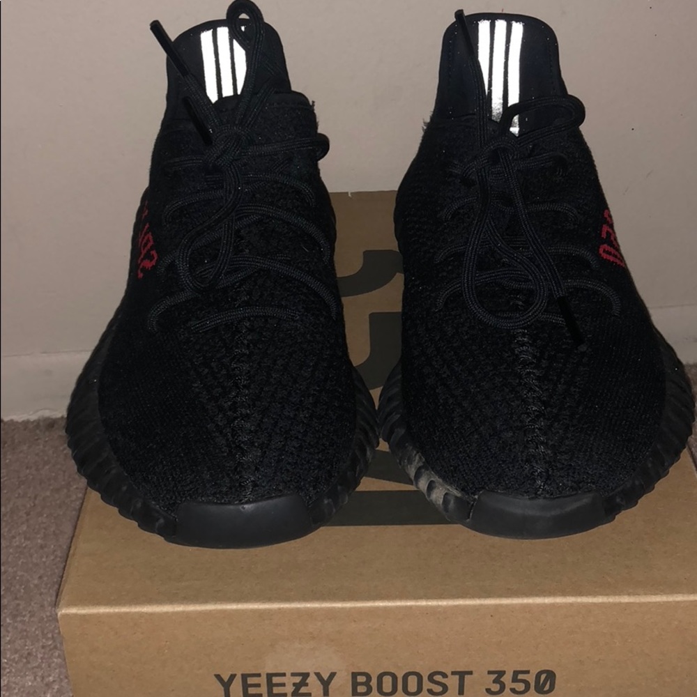 100% authentic yeezys black and red